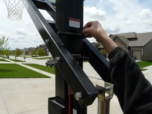Bison HangTime 6" Adjustable Height Basketball System With 72" Clear Glass Backboard 5 Bison HangTime 6" Adjustable Height Basketball System With 72" Clear Glass Backboard - Image 3